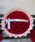 100 Red Roses On Pink Wrapping